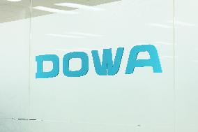 DOWA Holdings sign and logo